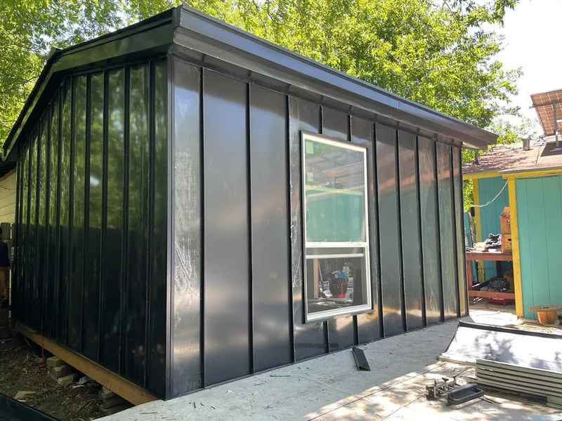 Black standing seam metal wall panels for Roof Inspection in Chisago City